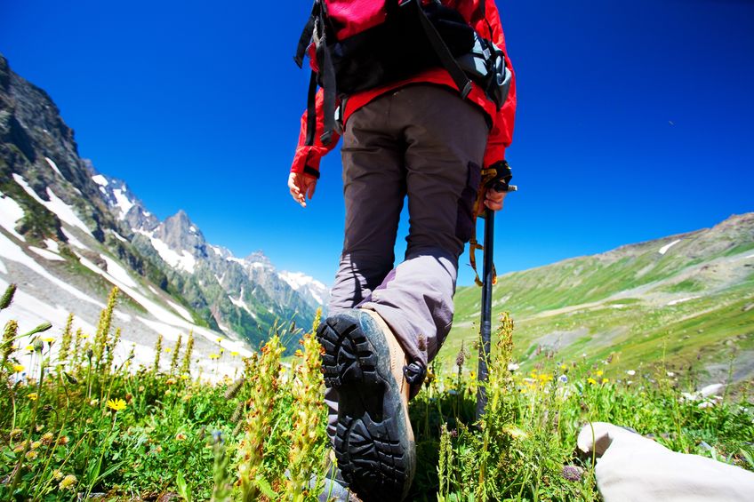Man hiking up a hill