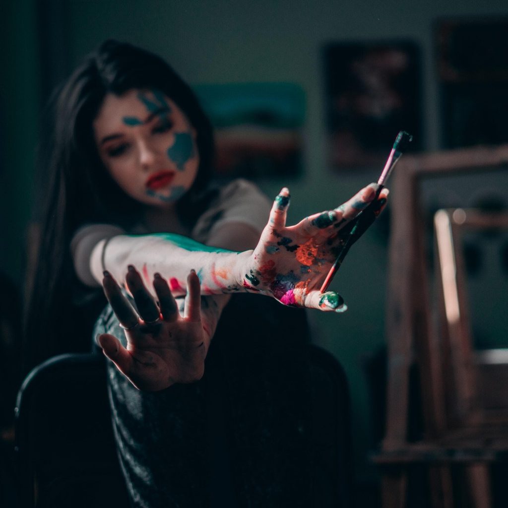 Artist-analysing-their-work